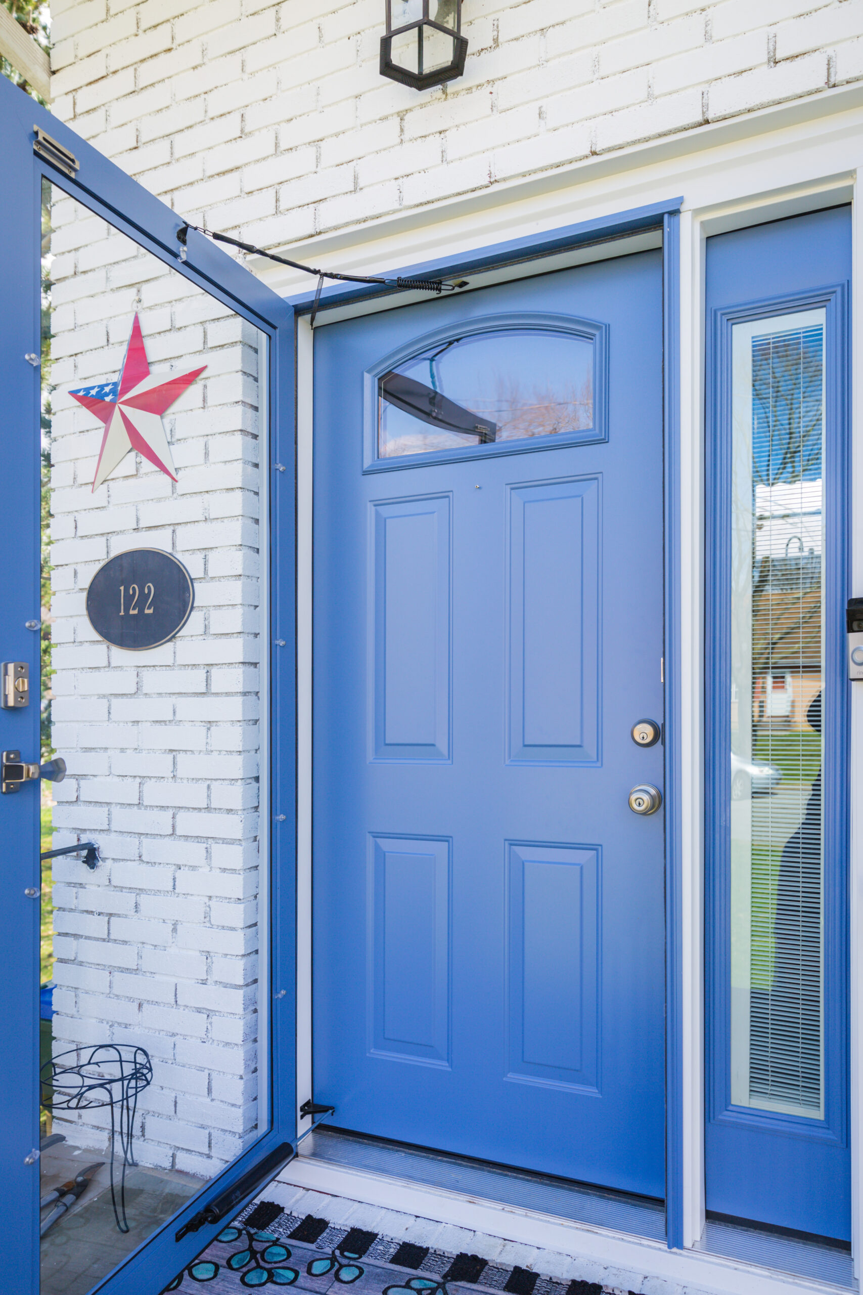 A blue door with a star on it.