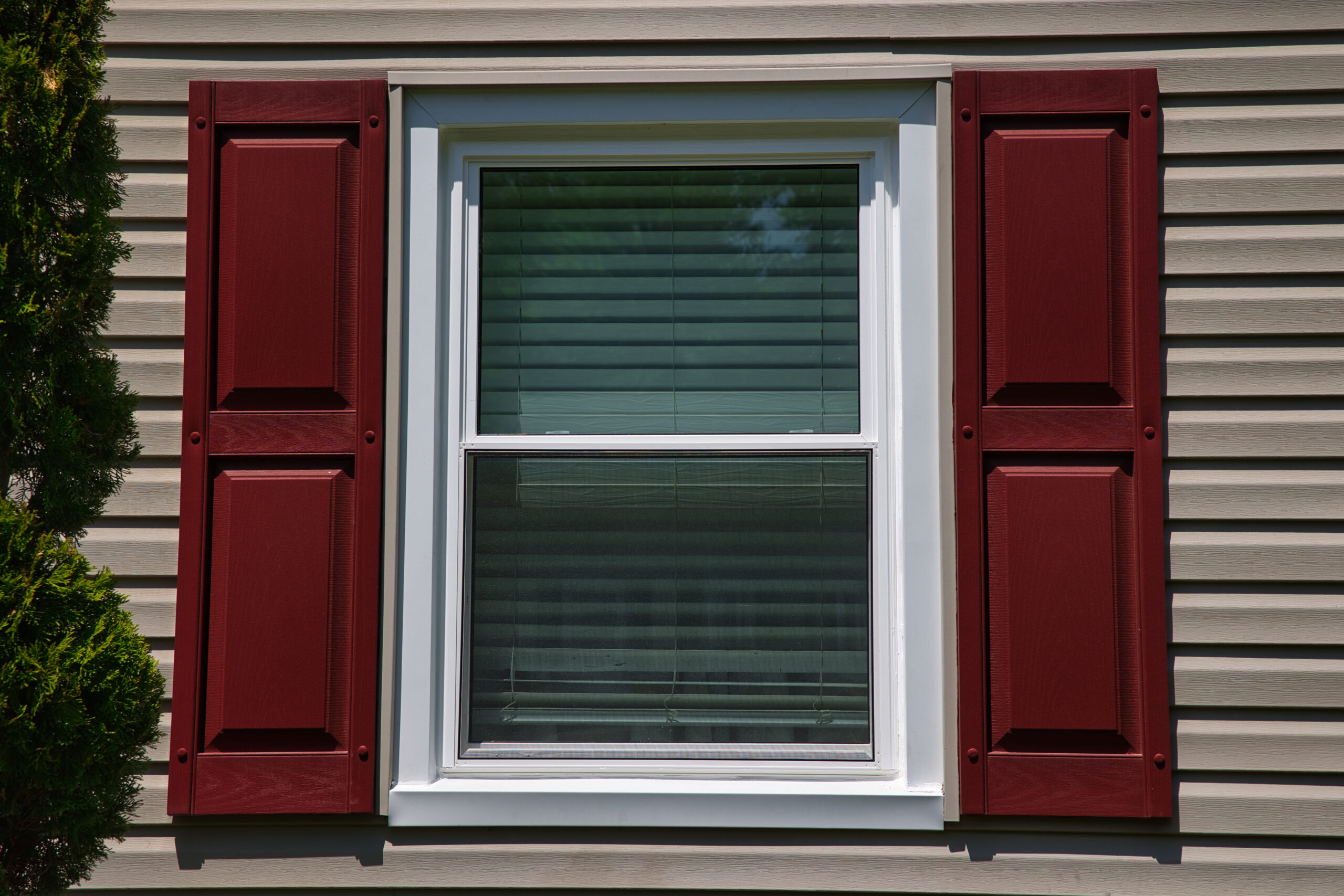 A window with red shutters.