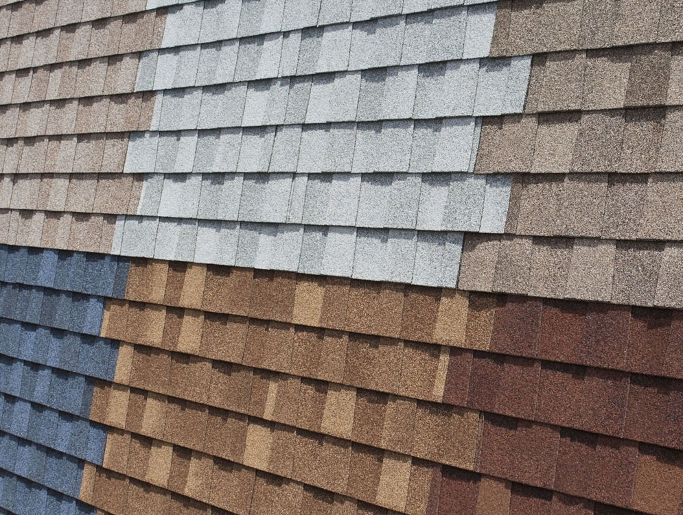 A close up of different colors of shingle shingles.
