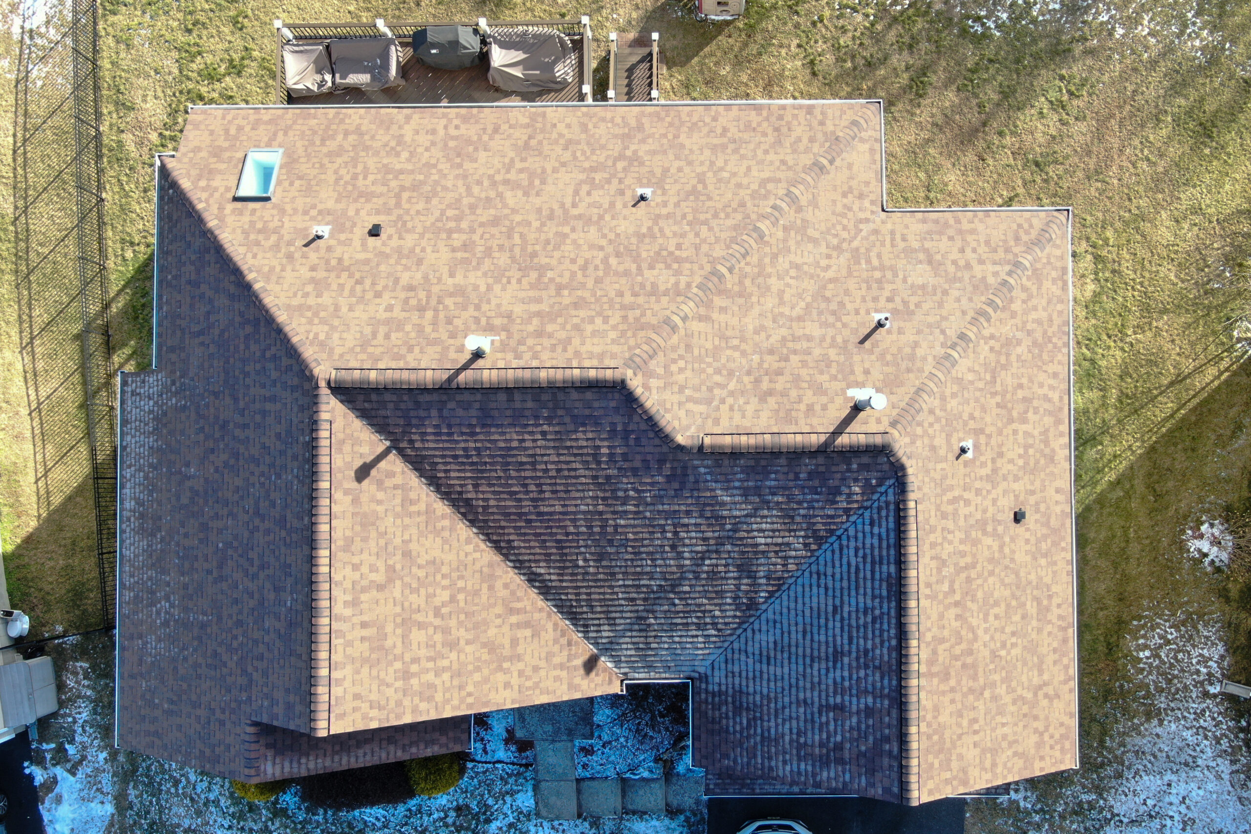 An aerial view of a house with a roof.